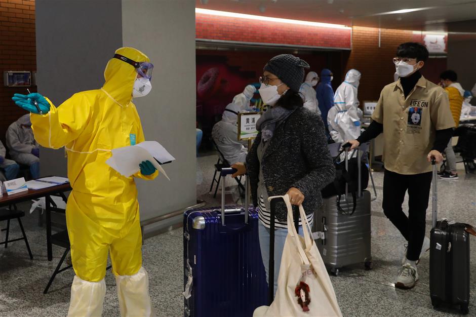 how shanghai controls the influx of coronavirus cases from overseas